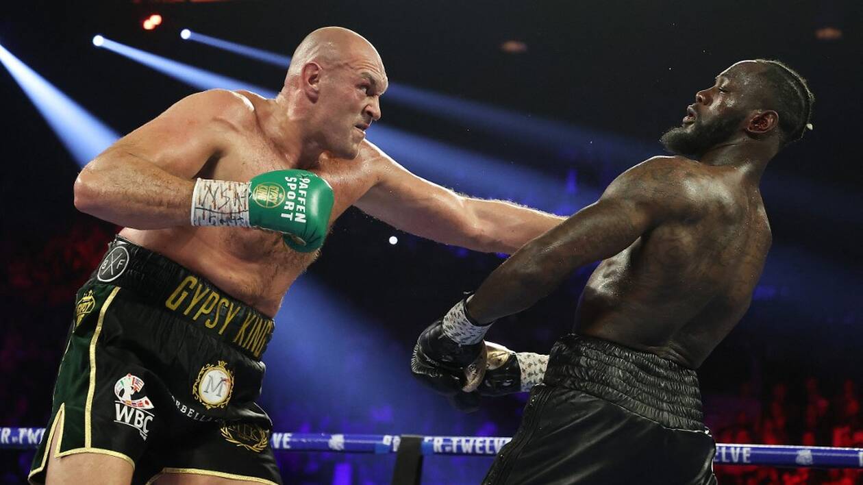 Tyson Fury en plein combat contre Deontay Wilder, démonstration de sa technique de boxe